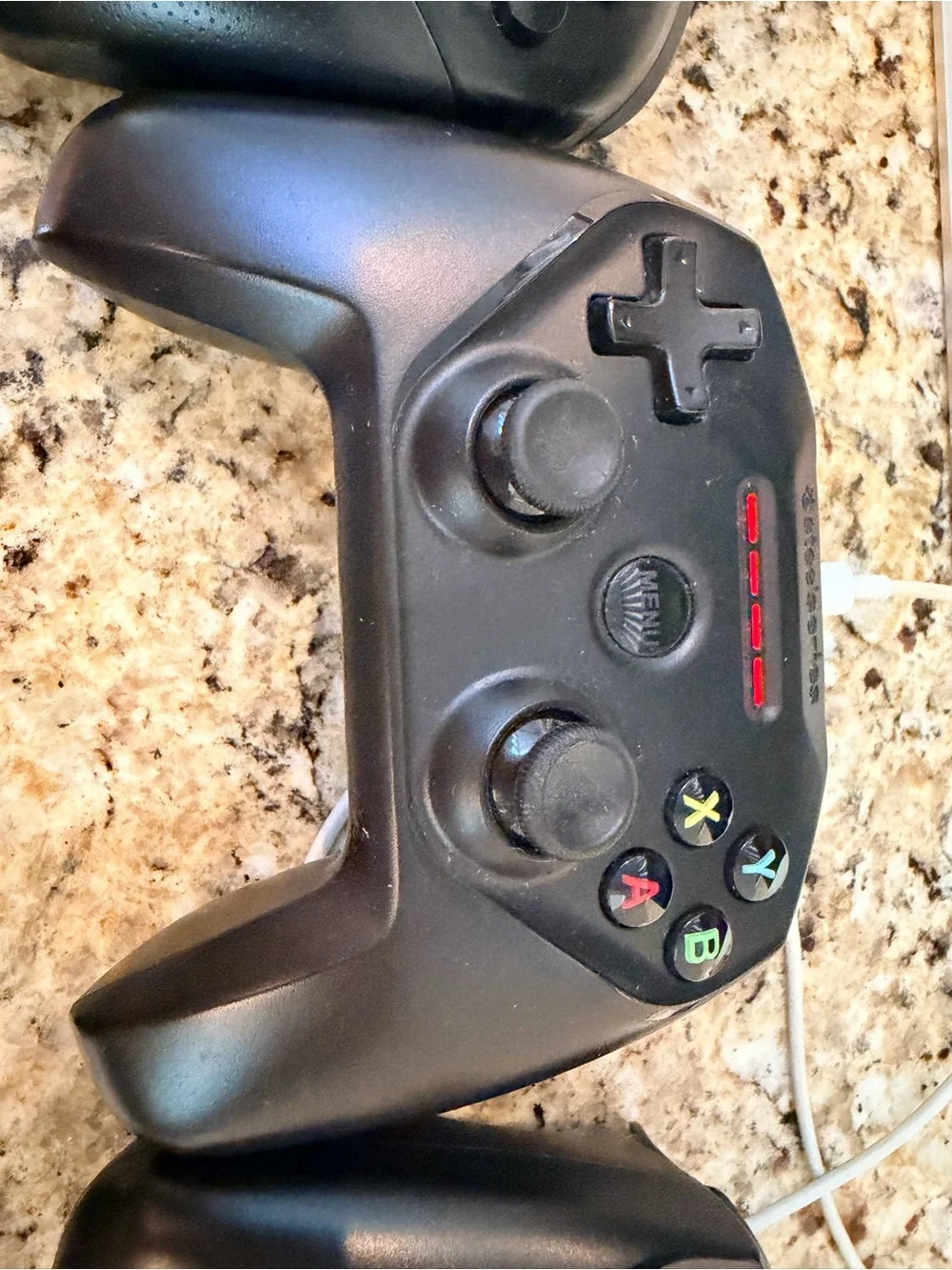 2 steel nimbus controllers and 1 Nintendo switch pro controller